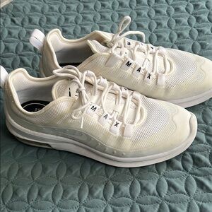 Nike White Sneakers with Textured Fabric and Cushioned Sole